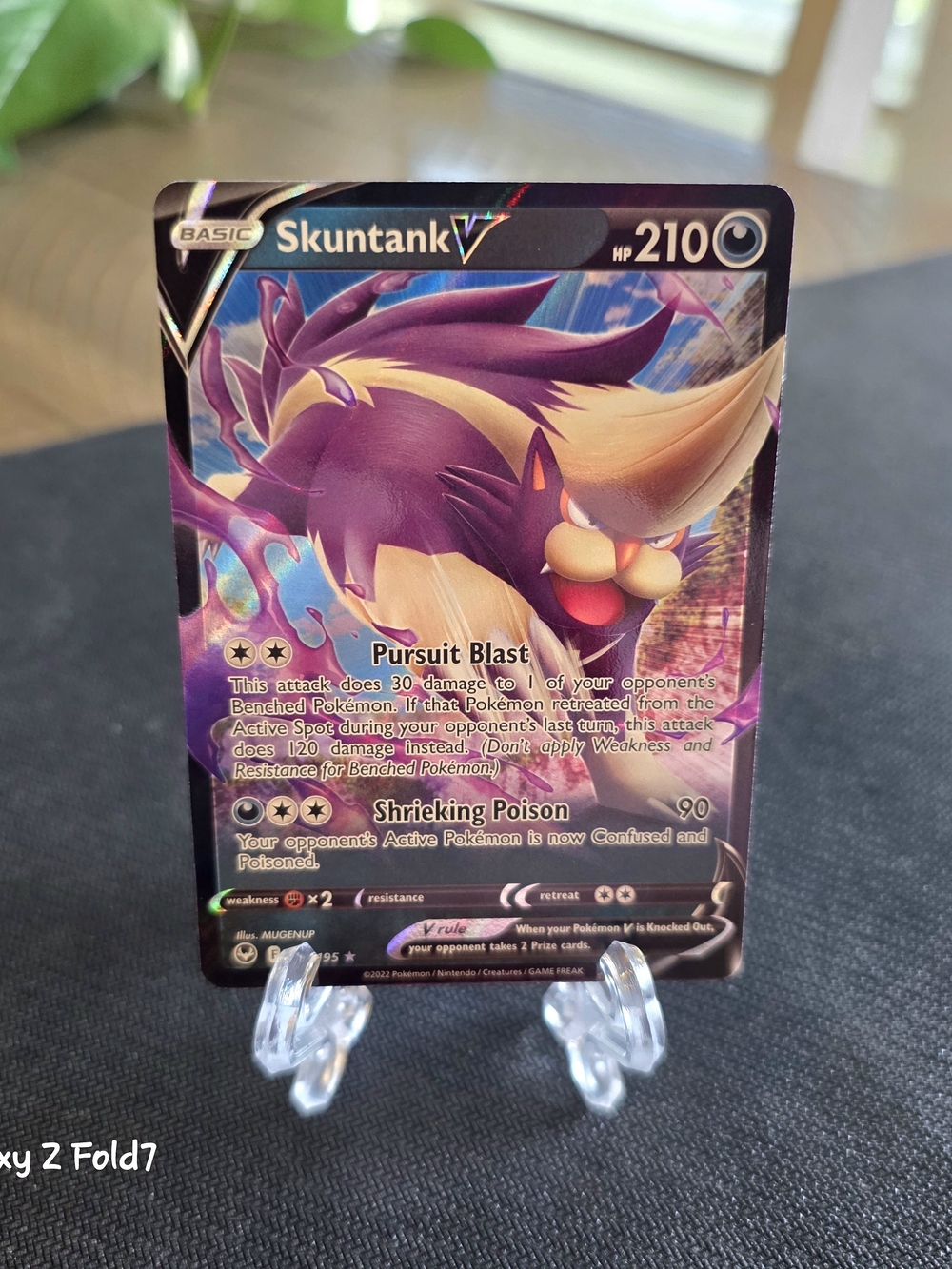 Pokemon Skuntank V Trading Card - Purple and Cream